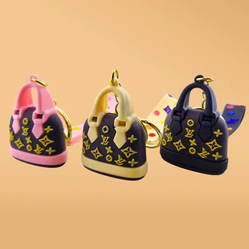 آویز جاکلیدی سیلیکونی گلد طرح کیف